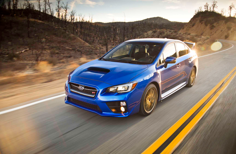 Illustration for article titled Oppositelock Review: '15 WRX STI vs '13 Mustang GT 5.0
